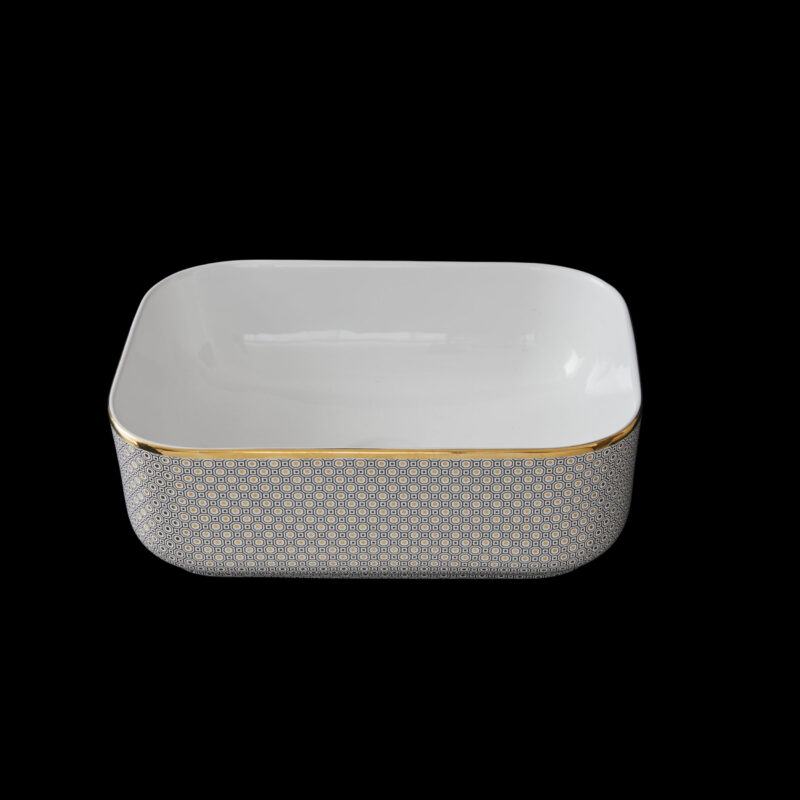 Porcelain luxury bathroom sink with geometric art deco design.