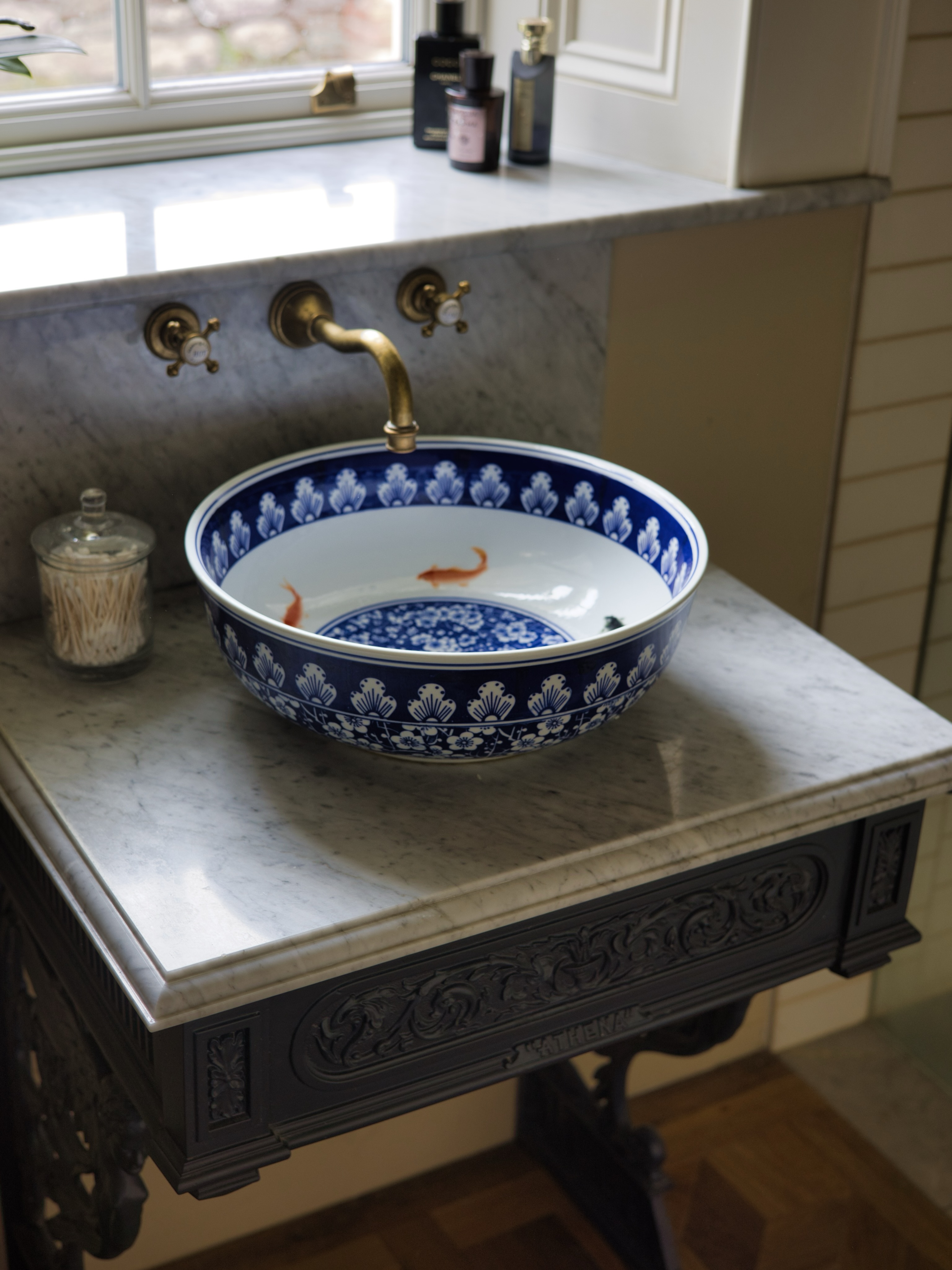 Would you turn an antique sewing table into a bathroom vanity? ✨ Beautifully designed by...
